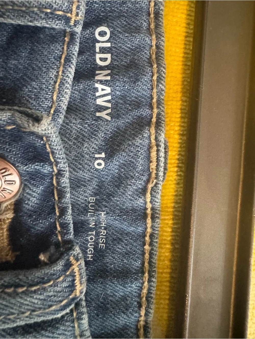Old Navy Blue Denim Cutoff Shorts with Embroidered Smile and Daisies